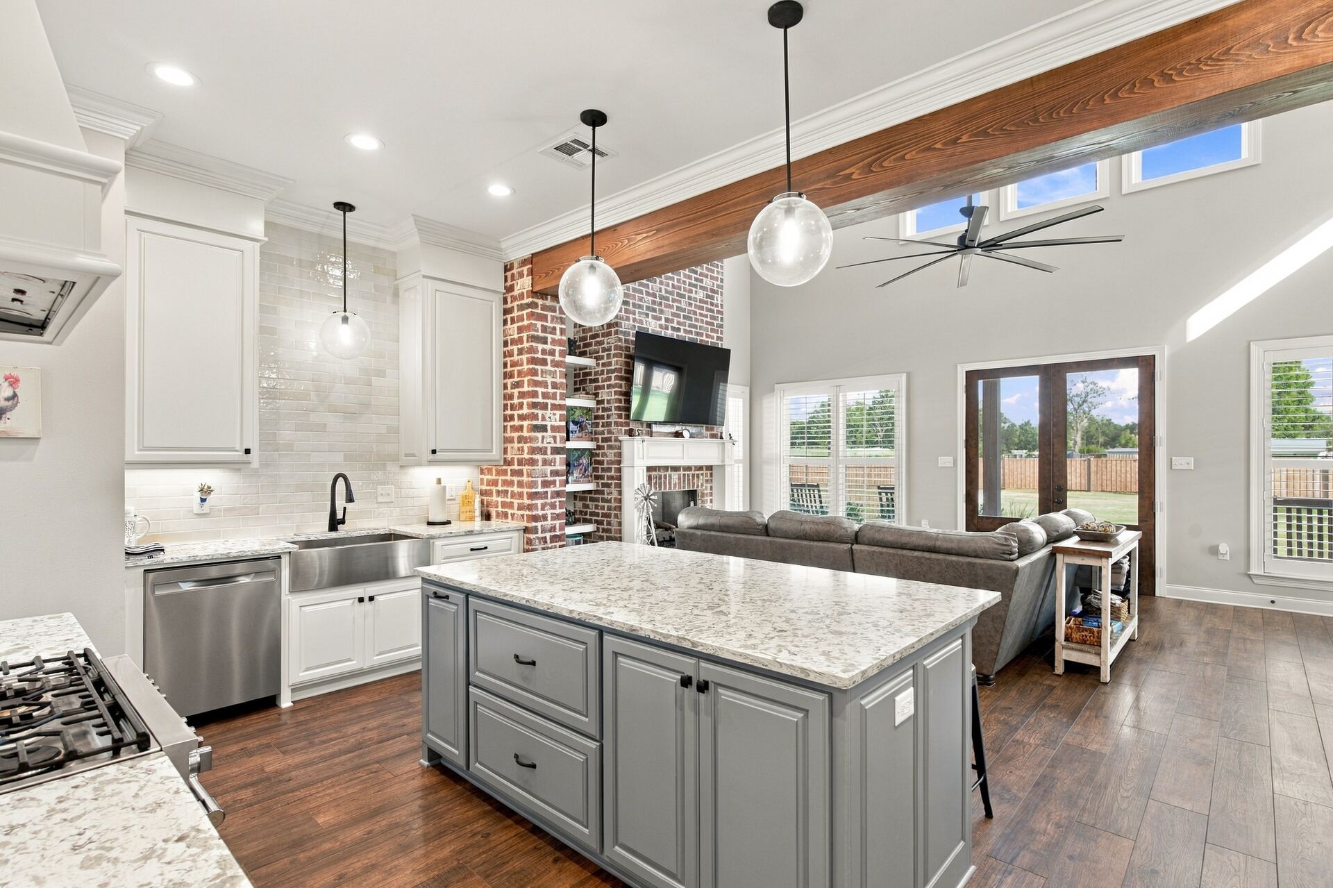 Kitchen with granite island and pendant lighting